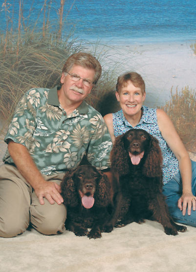 Paul and Lynn Morrison with two of their American Water Spaniels - photo 2