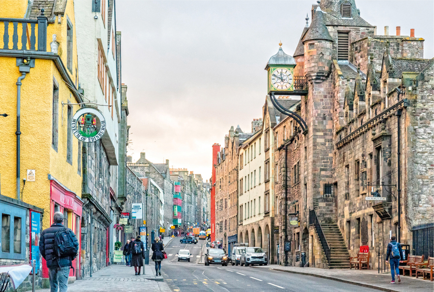 A view of Canongate in Edinburgh with the Canongate Tollbooth and clock - photo 10