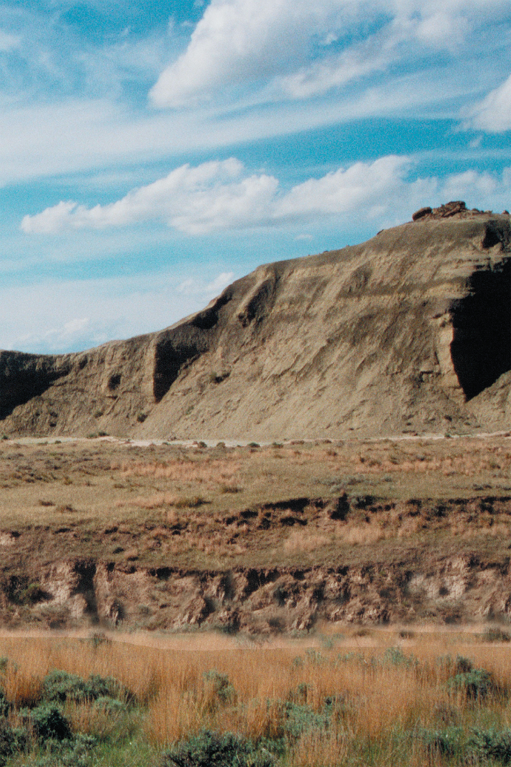 The badlands of Montana are home to many fossils Mike Henderson checks his - photo 4