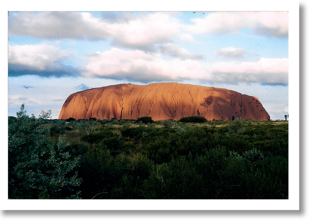 The afternoon sun on Uluru Ayers Rock Australian outback Upis campsite - photo 17