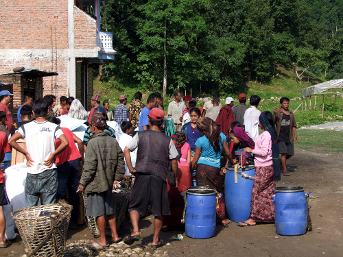 Porters assembling for work in Arughat Its swelteringly hot and still early - photo 2