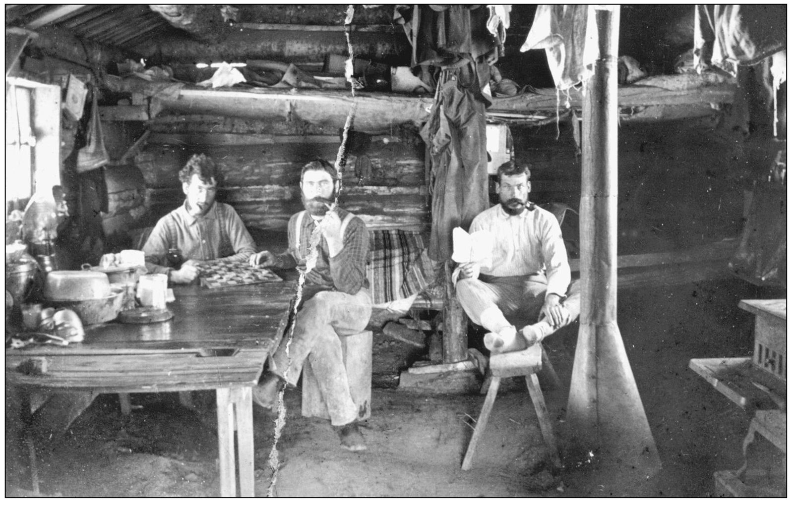 From left to right Roy Denny Charles Rinn and Tom Record relax inside the - photo 5