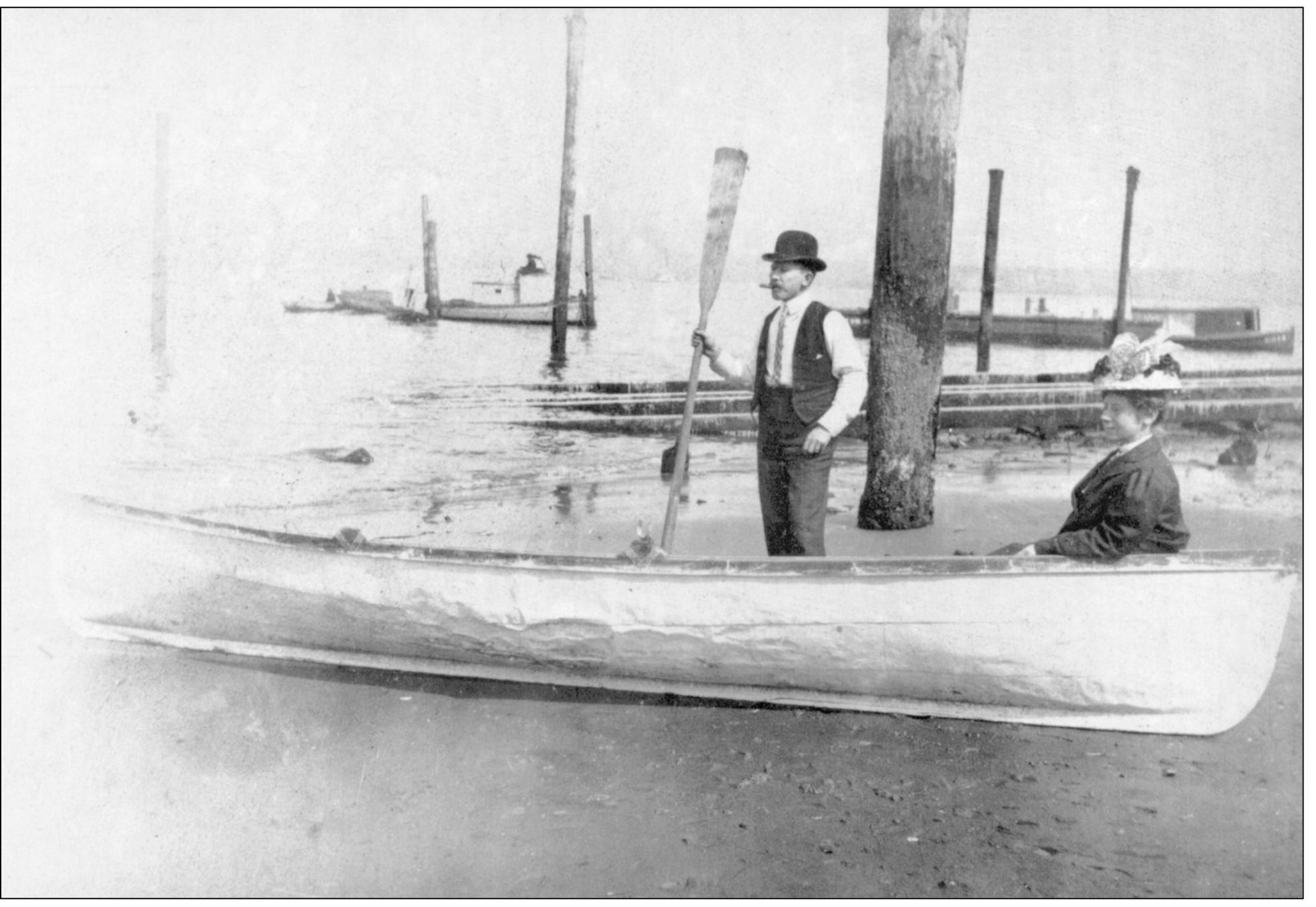 Ida and Claude Outland are pictured in their boat at low tide near Bonair Drive - photo 5