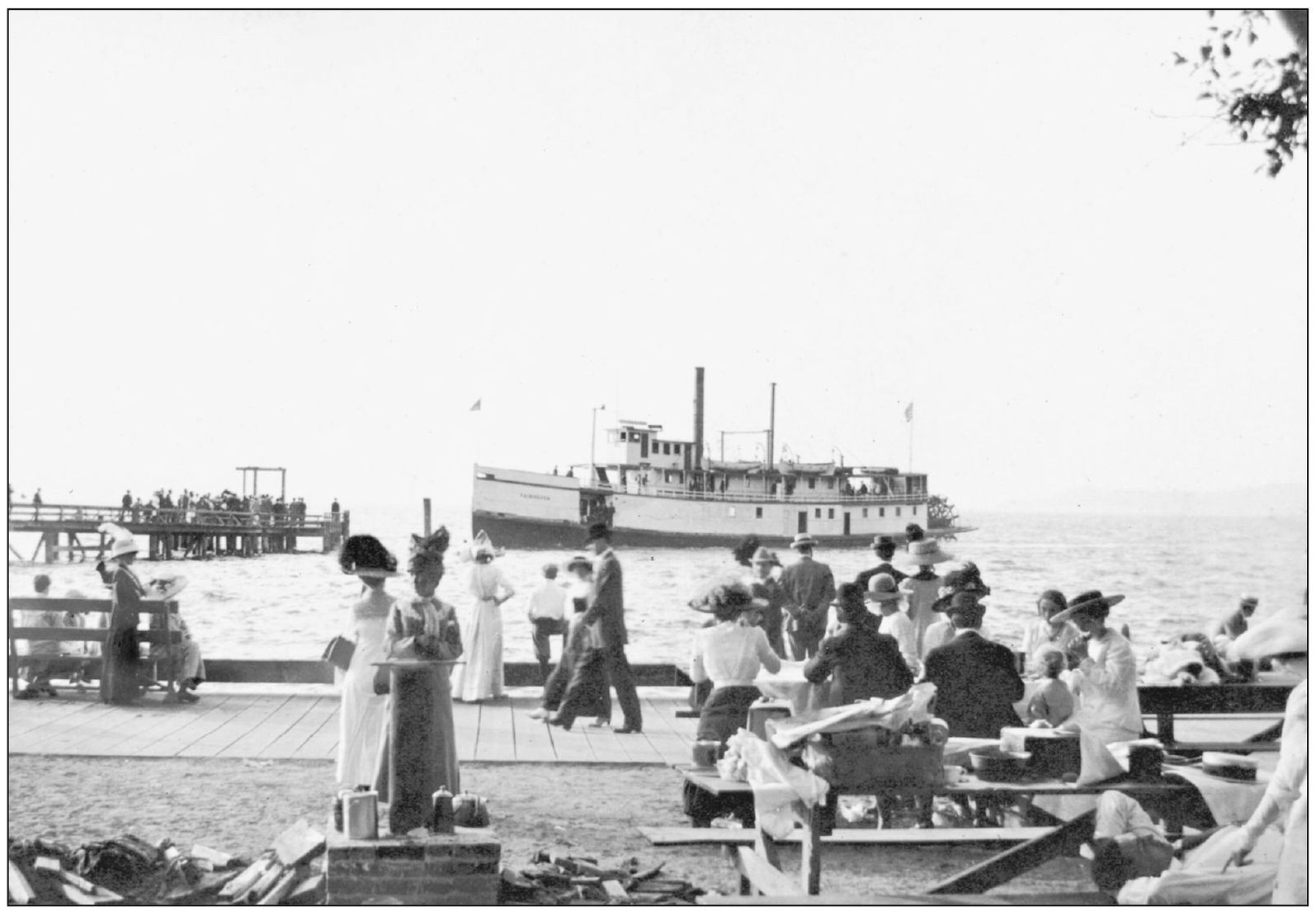 On the Alki boardwalk finely dressed picnickers and beach strollers enjoy the - photo 7