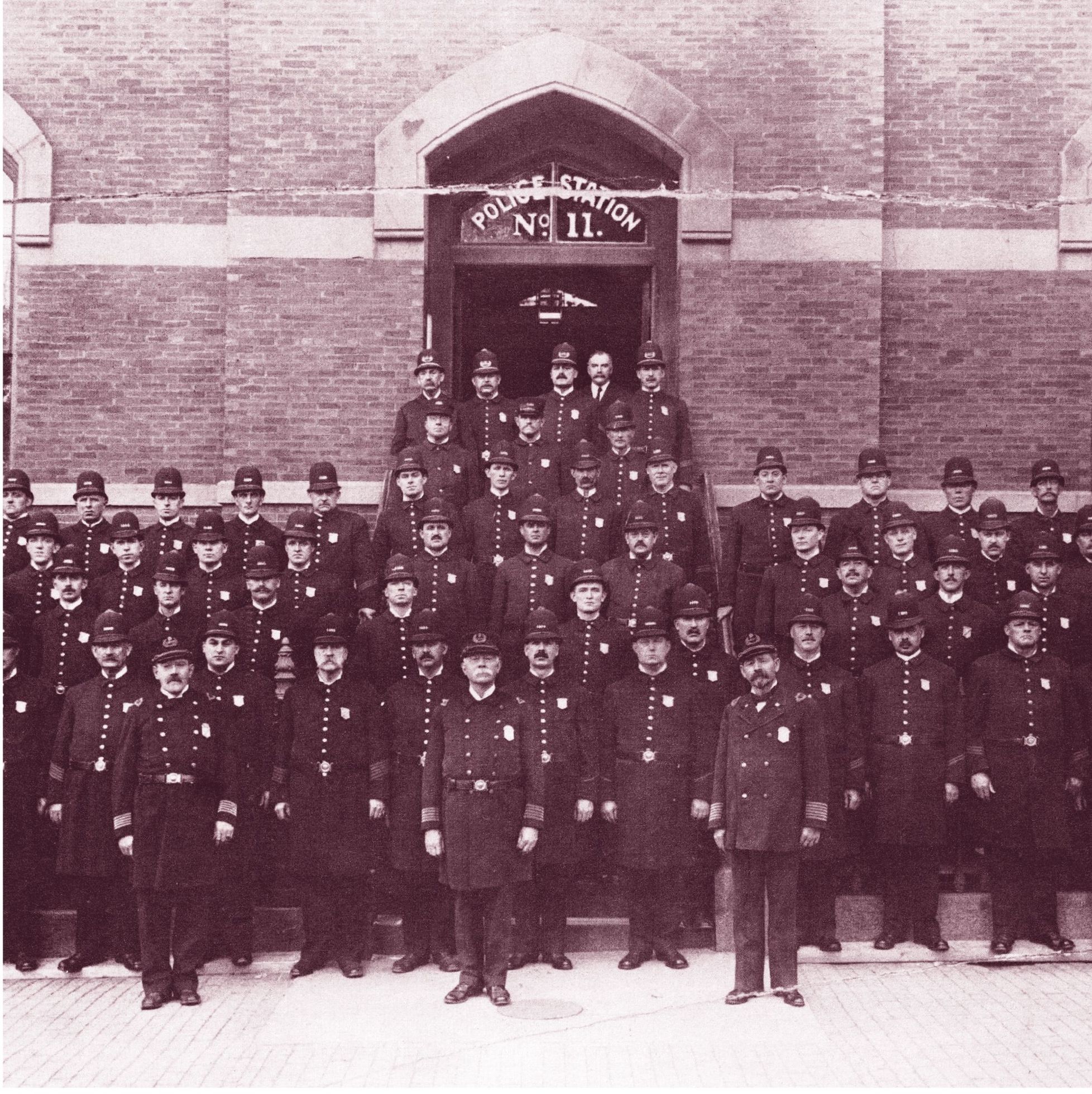 M embers of the Boston Police Department pose on the steps of Police Station 11 - photo 7