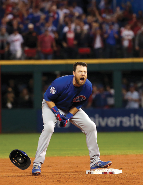 Ben Zobrist celebrates his RBI double in the top of the 10th inning in Game 7 - photo 5