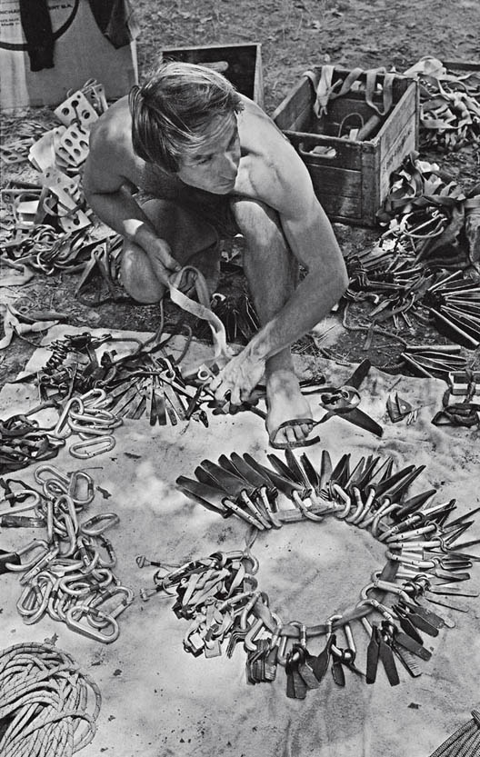 Yvon Chouinard sorting out 1969 Here we see the full range of pitons made by - photo 2