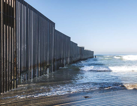 At Border Field State Park beach in San Diego a wall extends out into the - photo 3