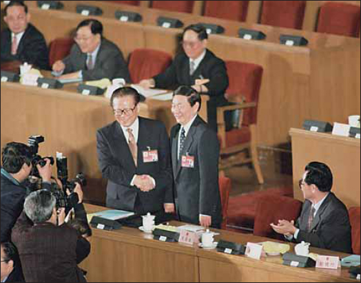 Being congratulated by Jiang Zemin on being named Premier by the first session - photo 2