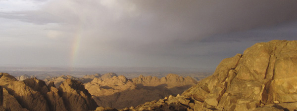 A panoramic view from the top of Mount Sinai The rainbow in the background is - photo 3