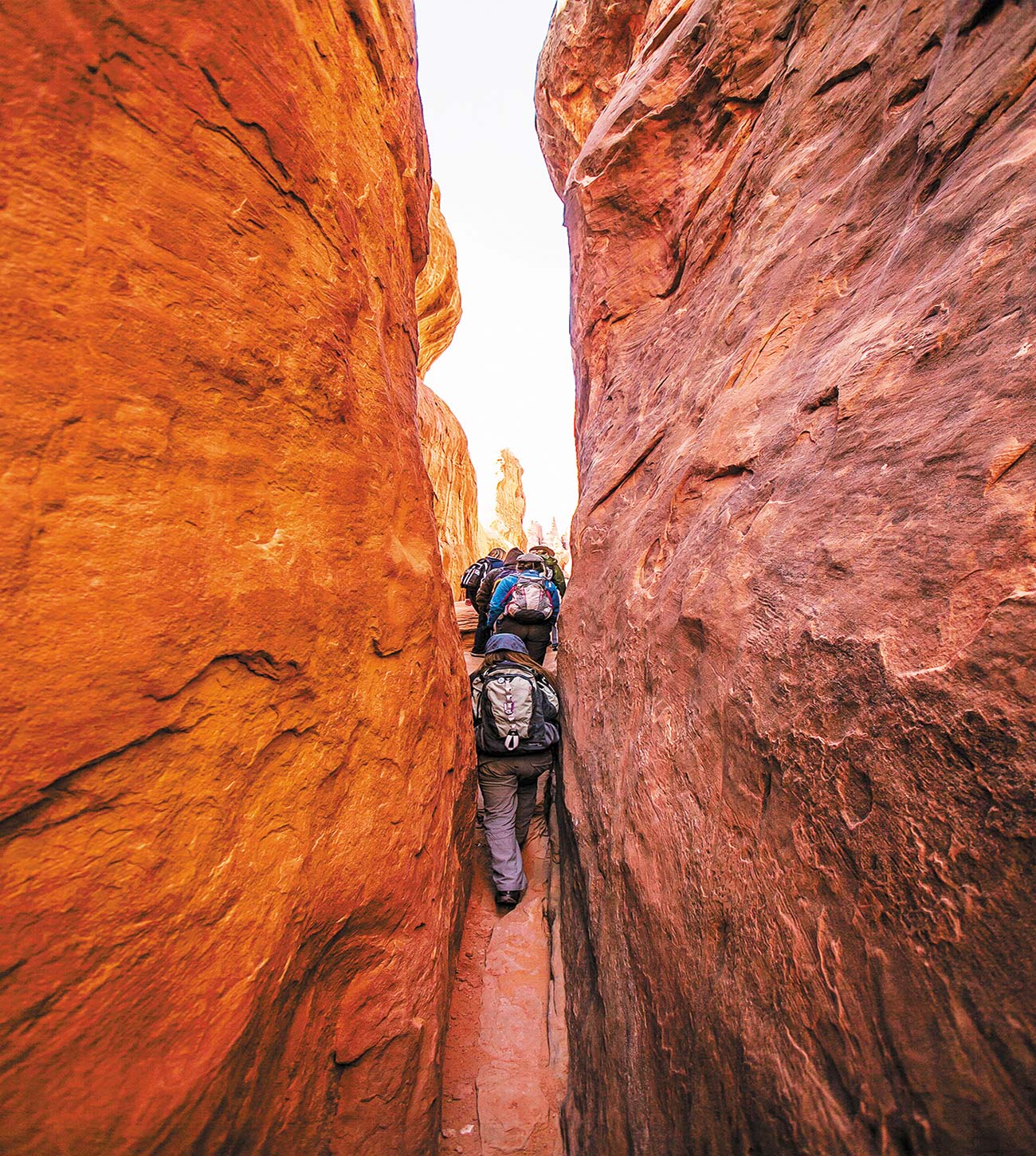 hiking through slot canyons in Arches National Park Take in the - photo 15