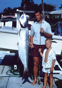 Posing with Dad and a tarpon at the Philpott family home in North Miami Beach - photo 14