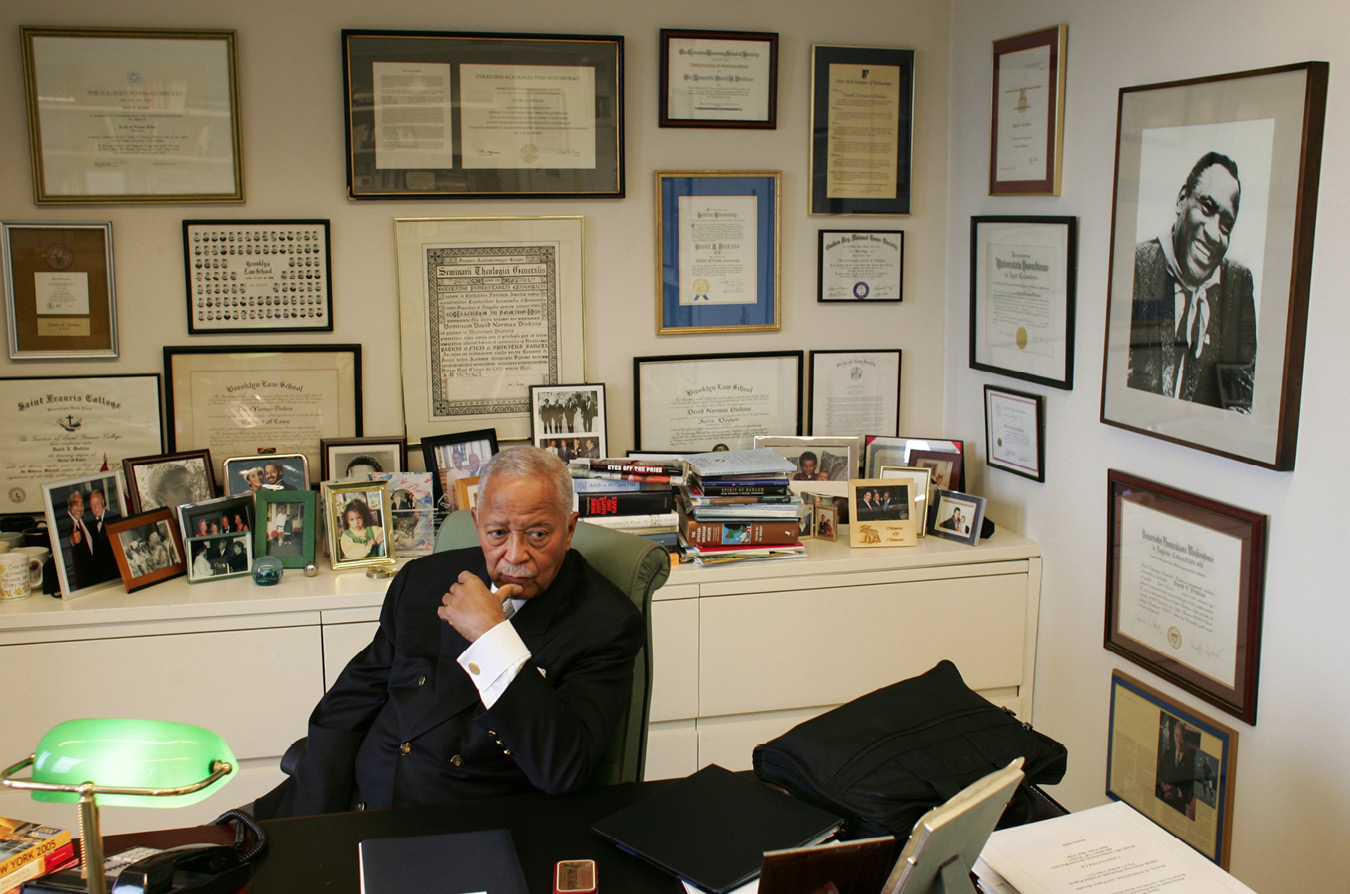 Former New York City mayor David Dinkins in his office with Robesons photograph - photo 4