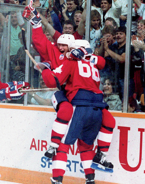 Wayne Gretzky and Mario Lemieux celebrate after Lemieuxs winning goal at the - photo 2