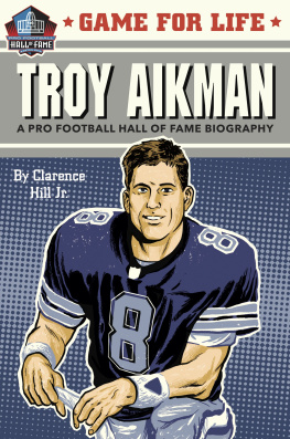 Clarence Hill - Troy Aikman