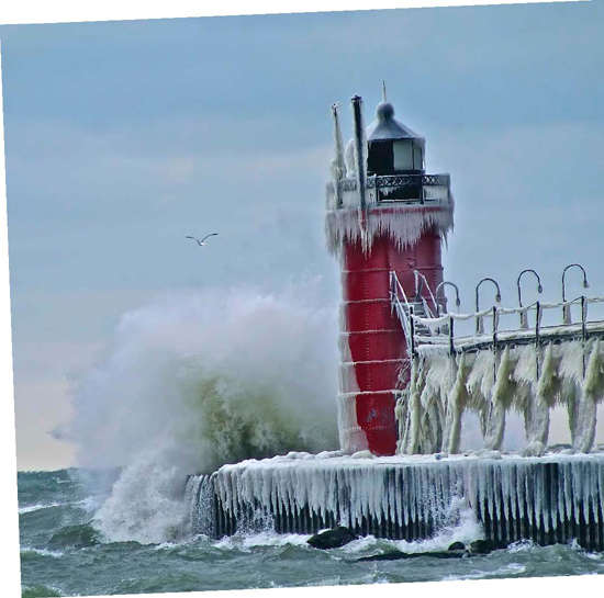 Strong winds big waves and cold air have covered this lighthouse on Lake - photo 9