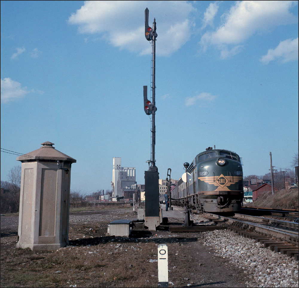 An Erie Railroad worker refuels Electro Motive Division E8A No 823 in Kent - photo 2