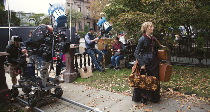 Jo March played by actor Saoirse Ronan prepares to enter the boarding house - photo 6