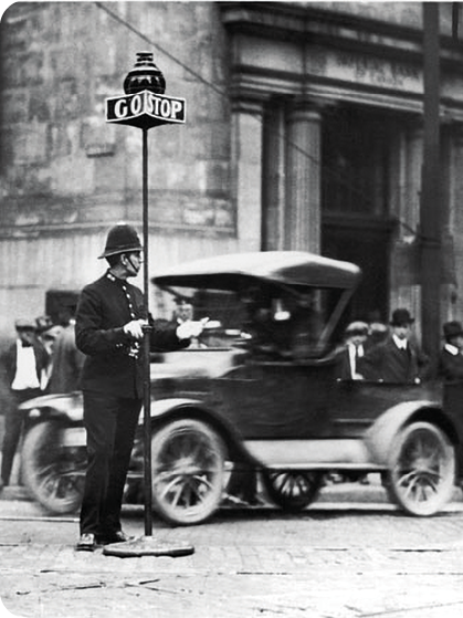 Before there were automated traffic lights signals were handheld A police - photo 8