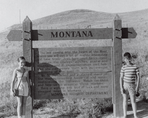 Jean and John Maclean at the Montana border crossing sign on a cross-country - photo 19