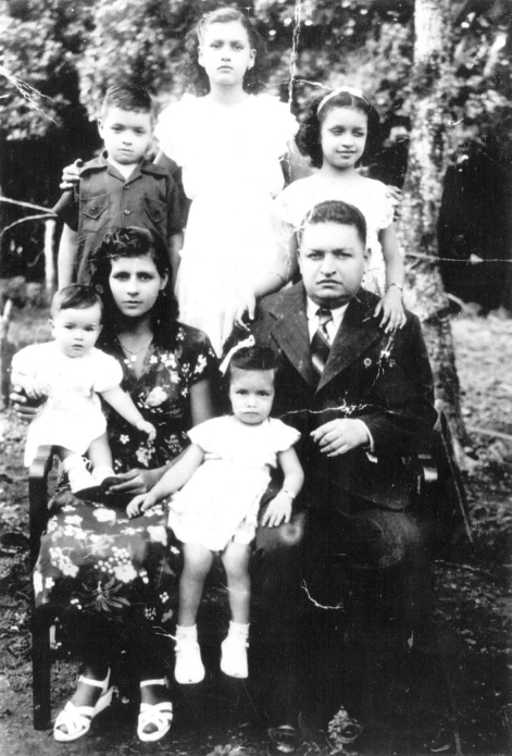 Bottom row left to right Luz Vega-Marquis in the arms of her mother Susana - photo 2