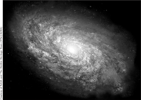 FIGURE 0-1 A spiral galaxy from a distance refer to page 278 for more - photo 11