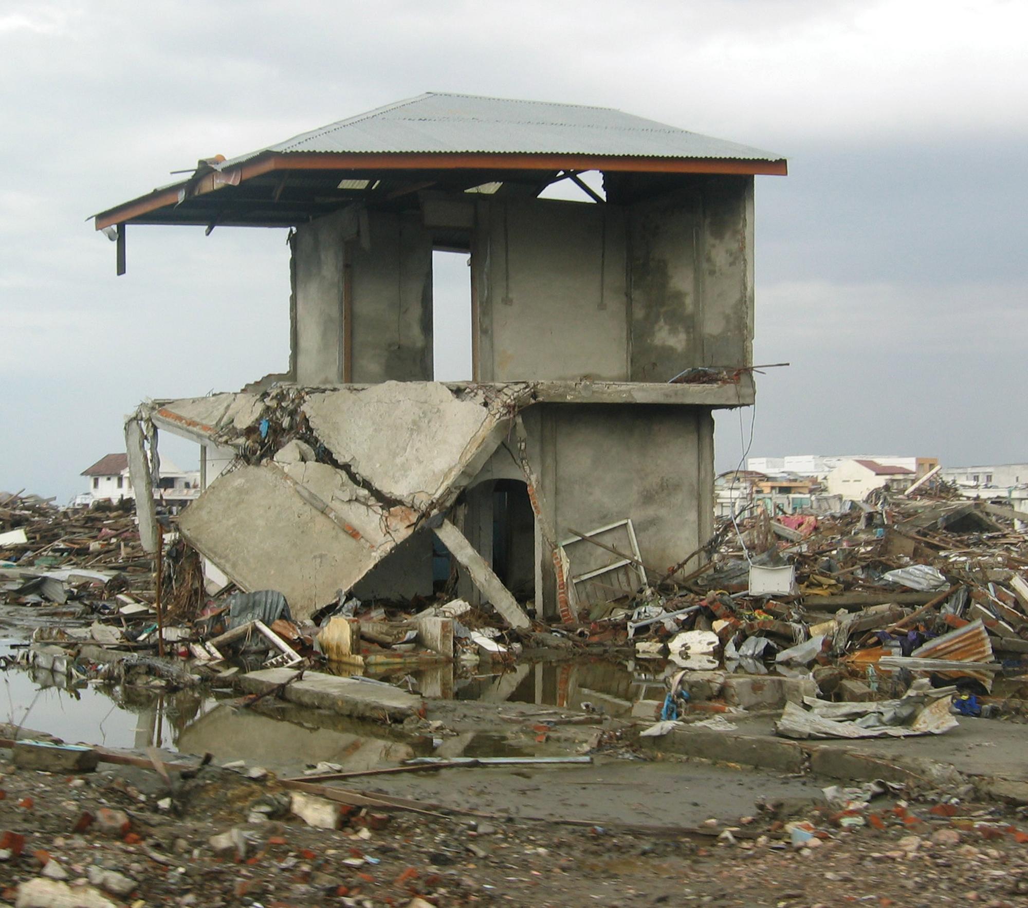 The massive destruction of the tsunami on December 26 2004 occurred all - photo 9