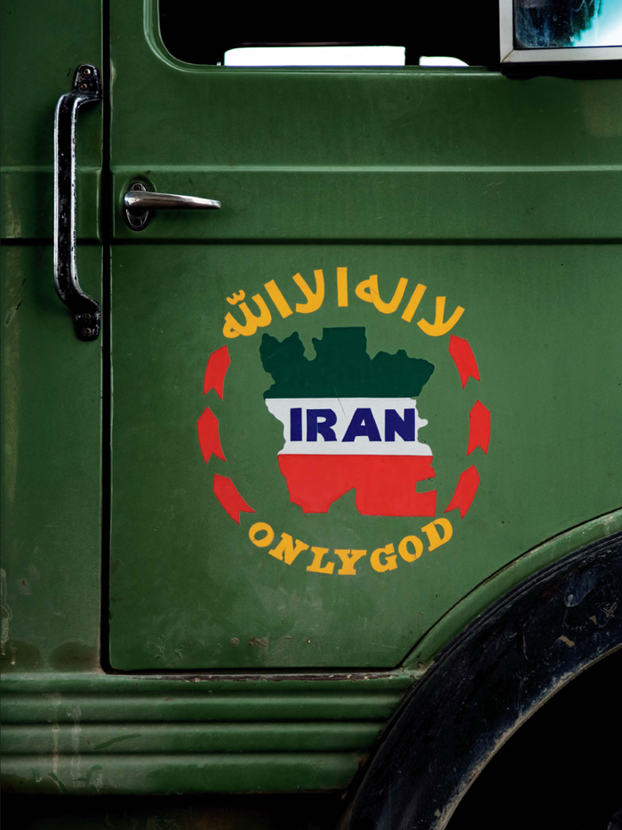 A truck at a gas station near Kashan displays Irans colors green representing - photo 2