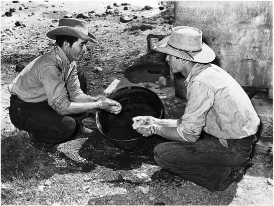 Mexican cowboys washing up after roundup on a cattle ranch near Marfa 1939 - photo 3