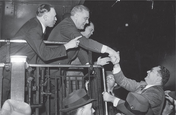 President Franklin Roosevelt shakes hands with Sherman Dalrymple president of - photo 7