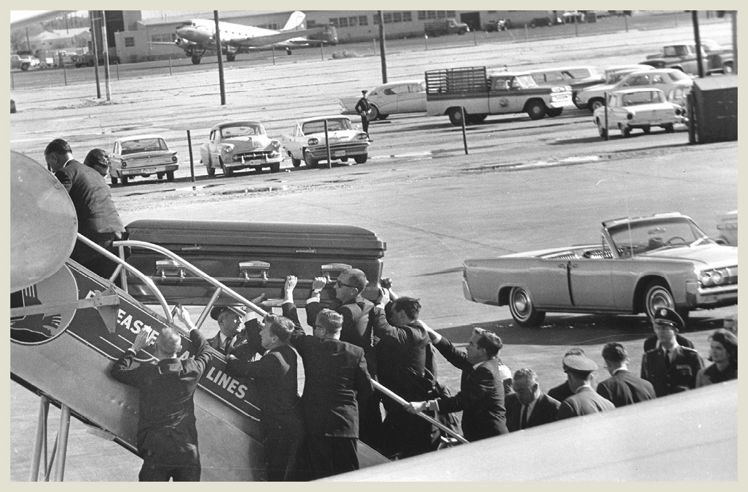 Jacqueline Kennedy far right waits to board as the body of her slain husband - photo 7