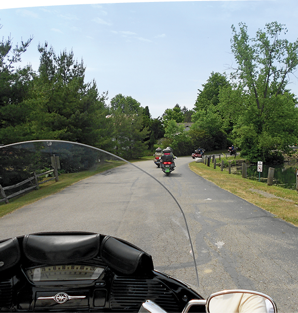 Motorcycles Passing Pond Ohioans believe they are at the heart of it all and - photo 3