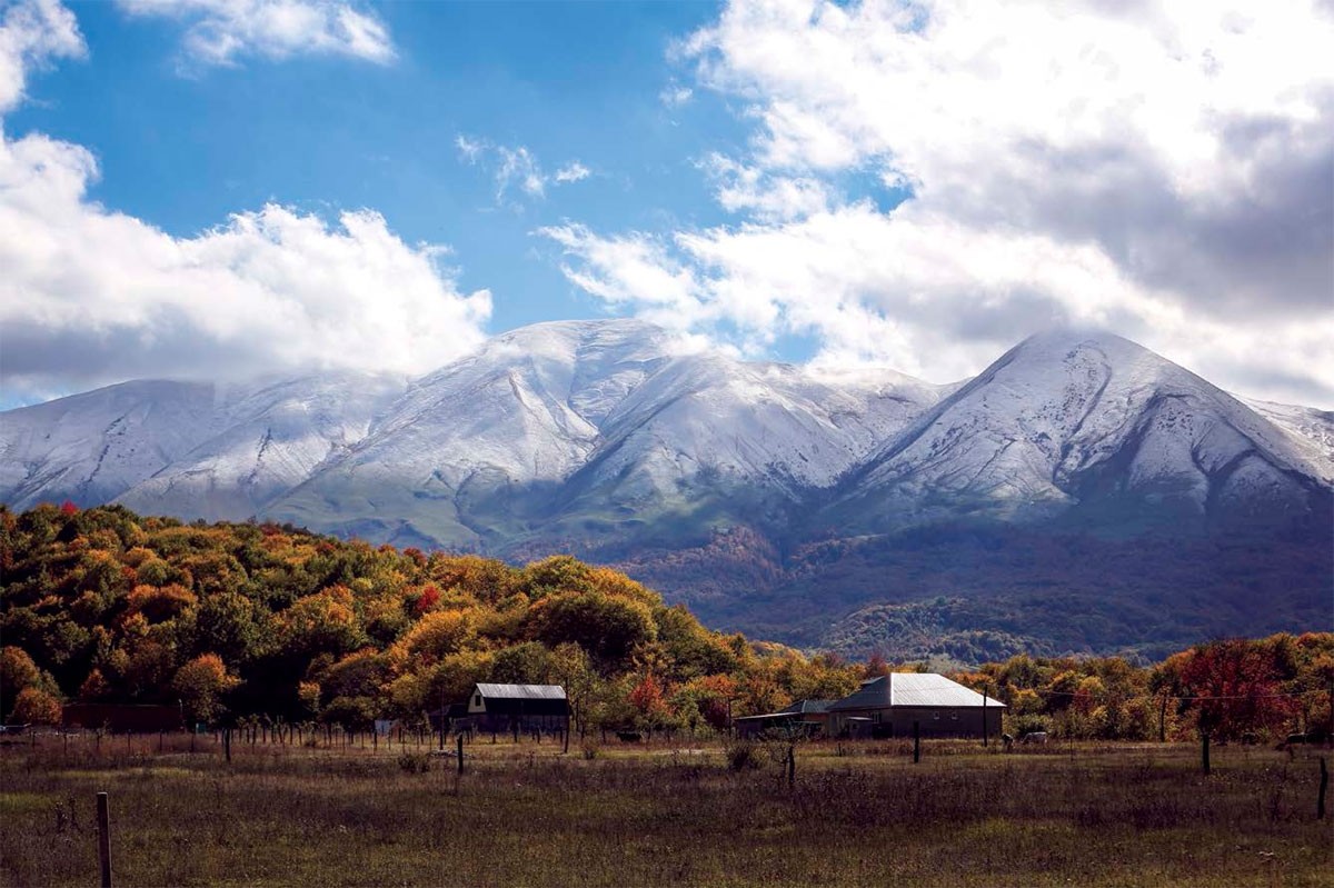 Dagestans landscape is a study in contrasts from snow-covered peaks to blooming - photo 5