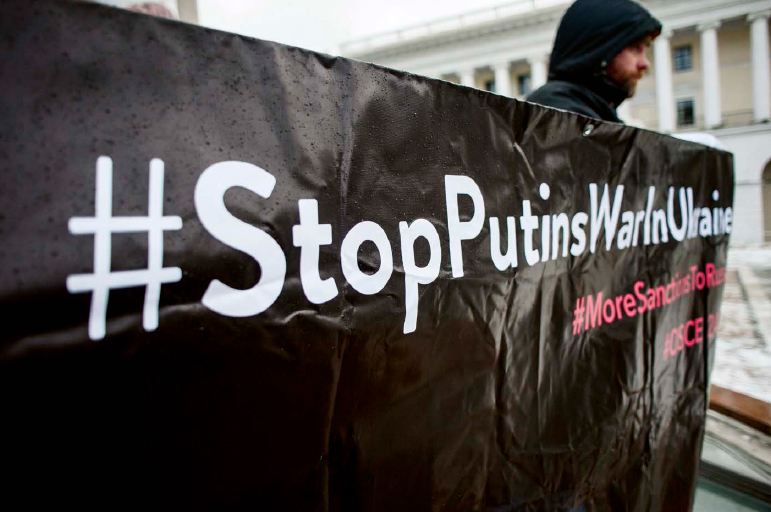 In January 2017 an activist in Independence Square in Kiev demands the - photo 6