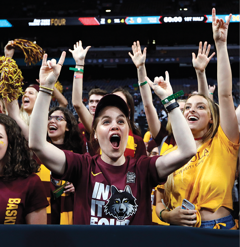 The Loyola Ramblers student section cheers as their team takes the court in San - photo 4