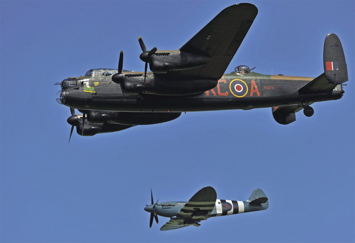 A Lancaster and Spitfire in flight over Normany on 5 June 2014 the eve of the - photo 4