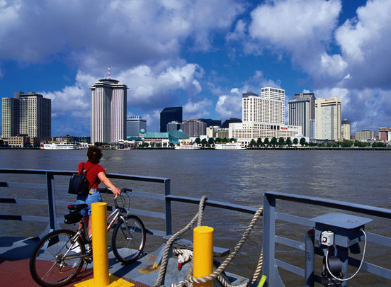 The city skyline looms on a ferry ride across the water LEE FOSTER - photo 4