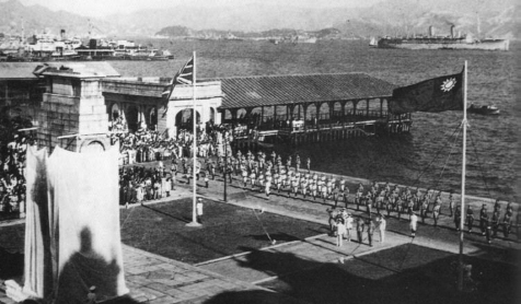 The flag of Nationalist China flies proudly beside the Union Jack during the - photo 17