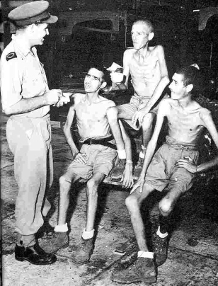 Emaciated British POWs giving an interview to a correspondent shortly after - photo 6