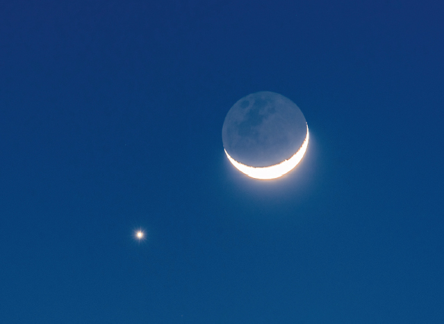 Venus and the crescent Moon in conjunction with the glow of earthshine visible - photo 16