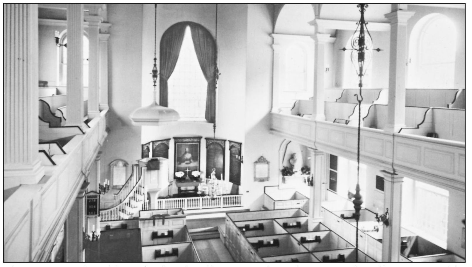 The interior of the Old North Church still retains its long slip pews and a - photo 6