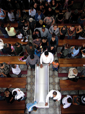 Daily mourning Family members lay to rest a murdered police officer in - photo 14