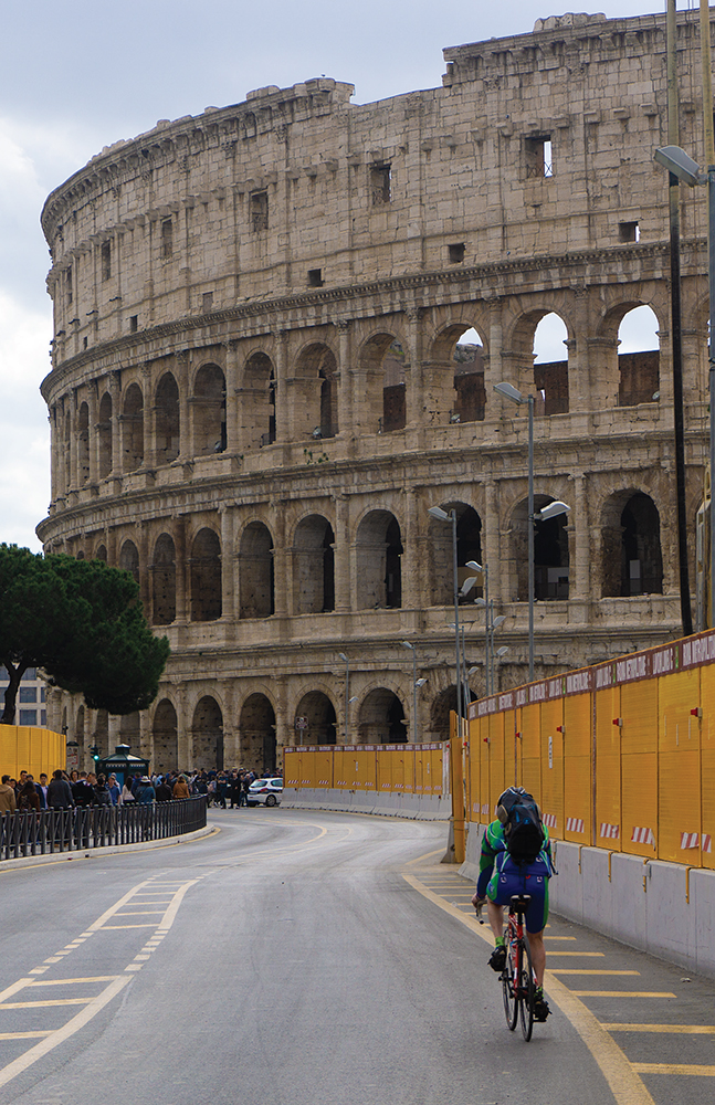 Stephen approaching the Colosseum on their way out of Rome Italian - photo 12