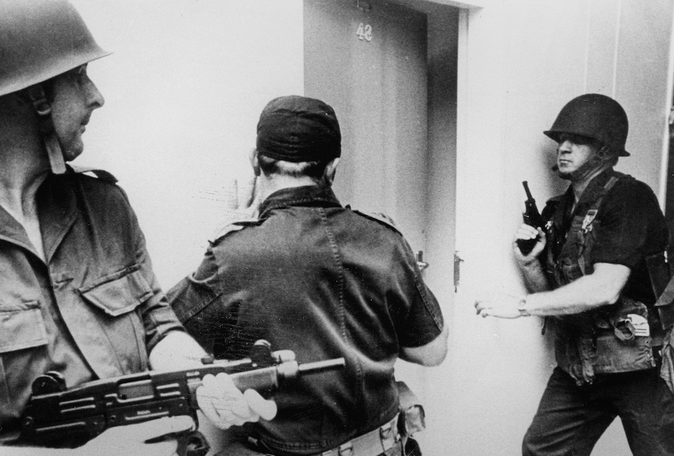 12 Rhodesian police SWAT teams wore distinctive blue denim uniforms and caps - photo 12