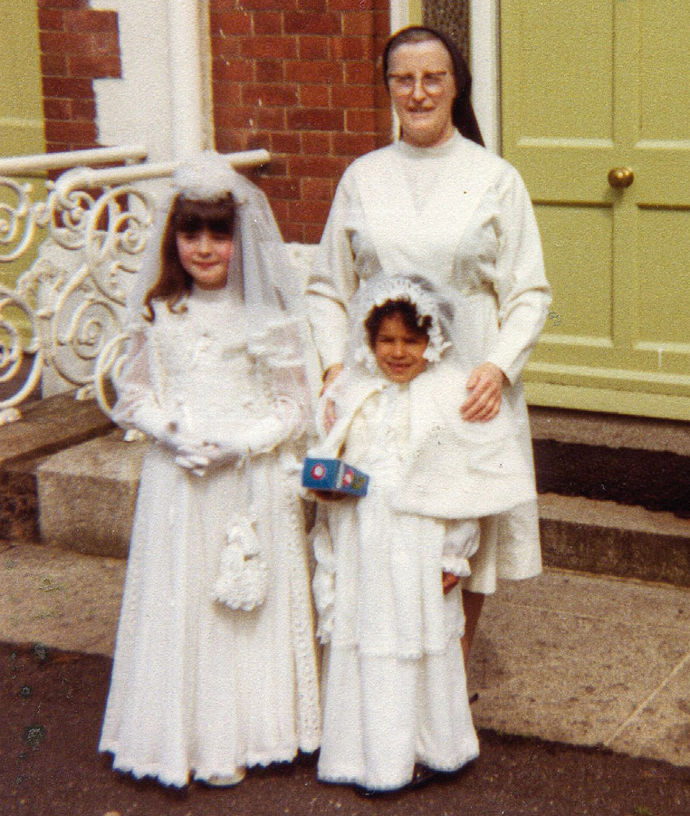 5 Ciara and me on our First Holy Communion day outside St Patricks on the - photo 5