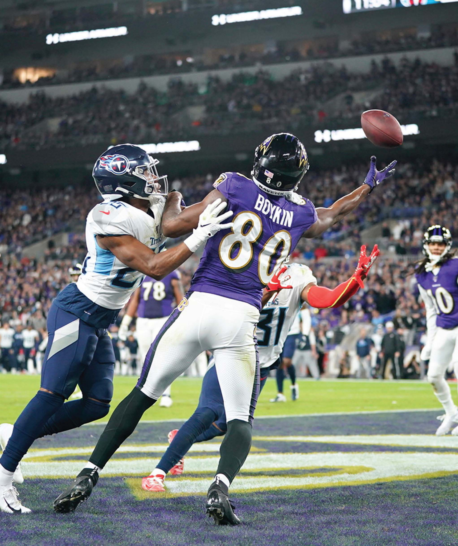 Baltimore Ravens wide receiver Miles Boykin attempts tocatch a touchdown pass - photo 3