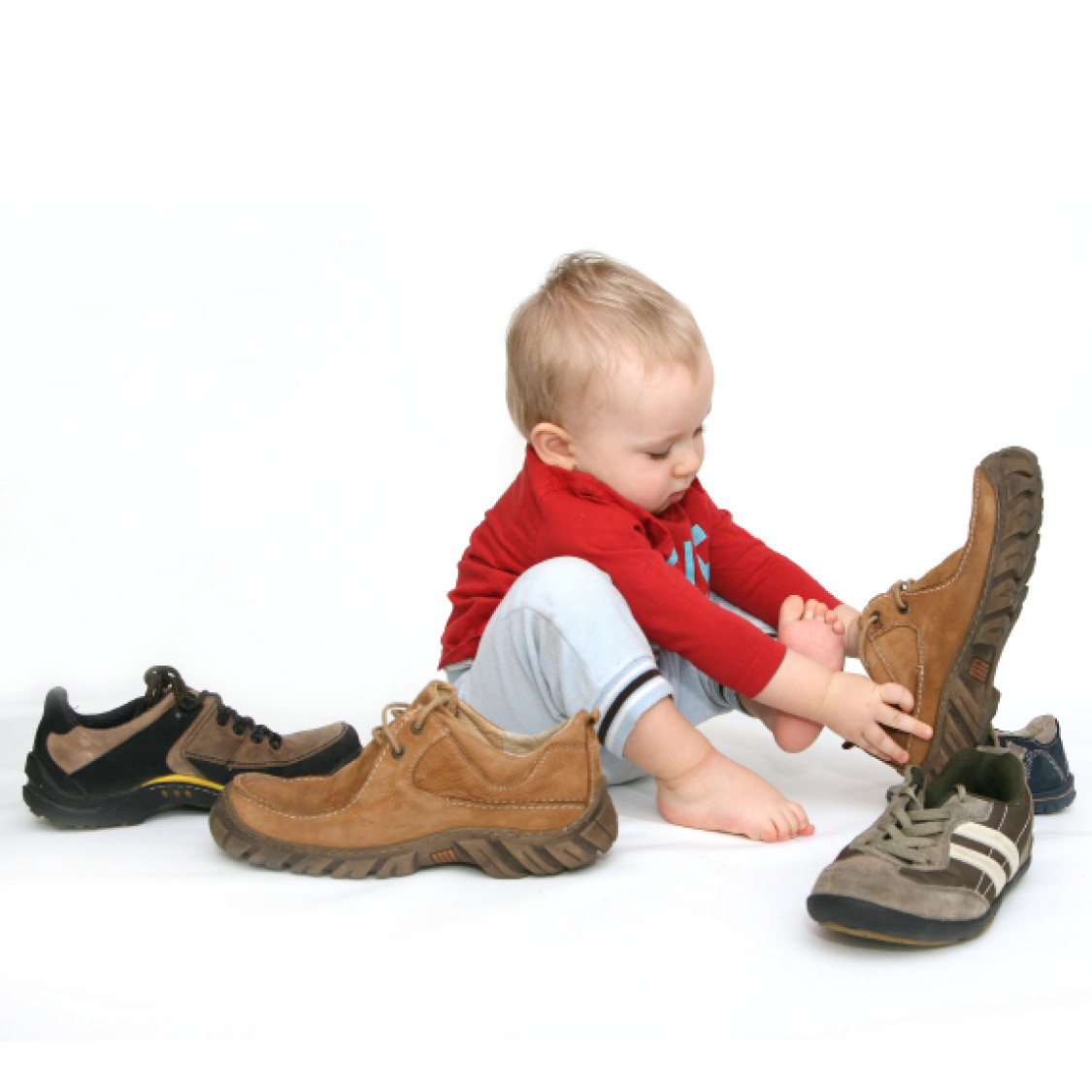 Babies love to play dress up This baby is trying on his dads shoes - photo 10