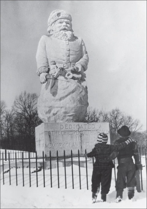 Patricia left and Raymond Yellig Jr admire the 22-foot-tall Santa Claus - photo 2