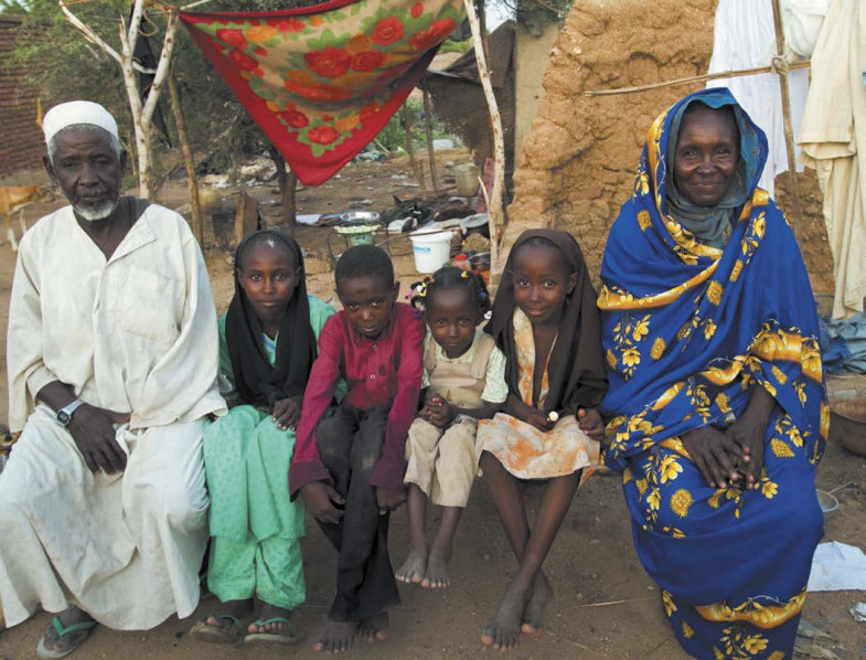 A Sudanese family is gathered outside their home In the twenty-first century - photo 6