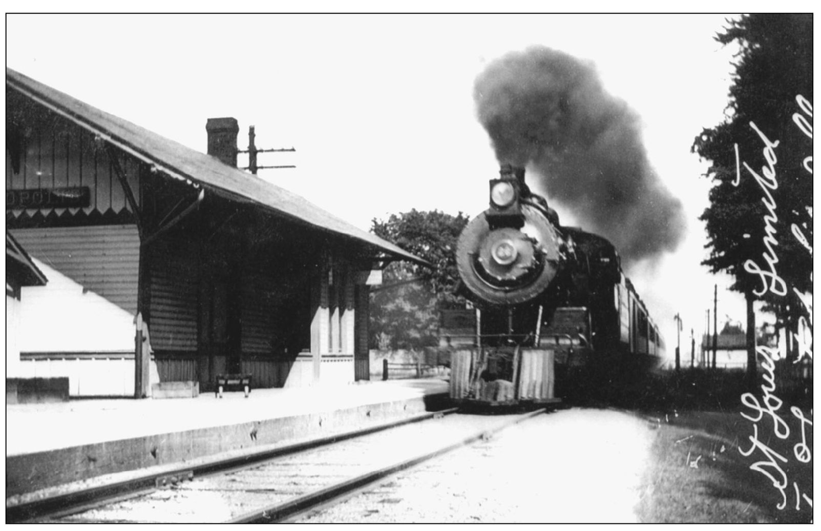 Here is the St Louis Limited swinging through the Teutopolis depot before the - photo 4